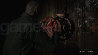 James turns a valve for the Silent Hill 2 Radio puzzle