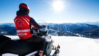 5 reasons you need an emergency blanket: mountain rescue snowmobile