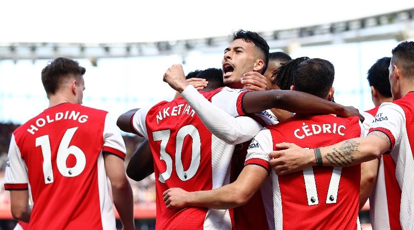 Arsenal players celebrate against Leeds.