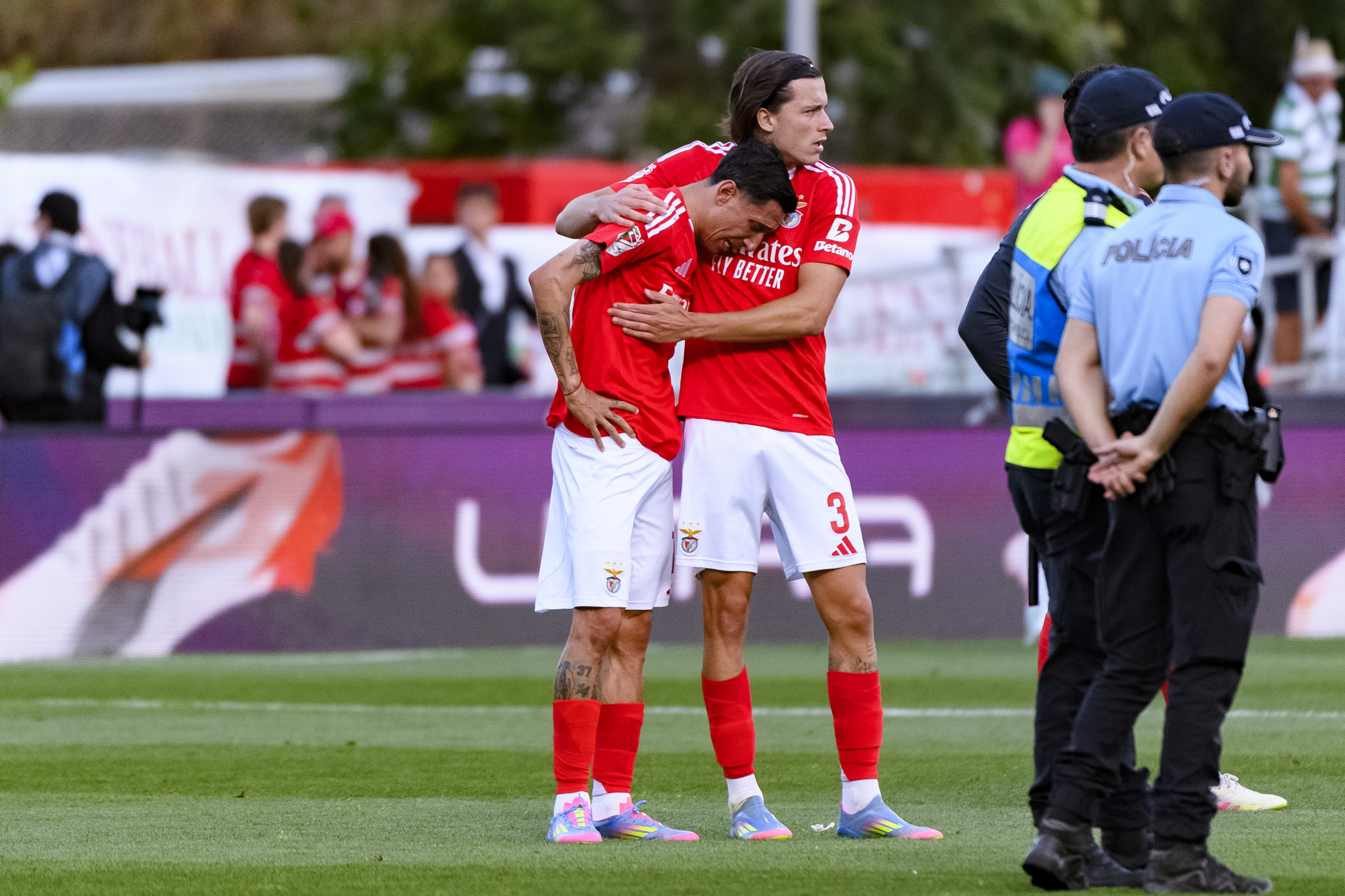 Angel Di Maria is consoled by Benfica team-mate Alvaro Carreras after defeat to Sporting CP in the Portuguese Cup final in May 2025.