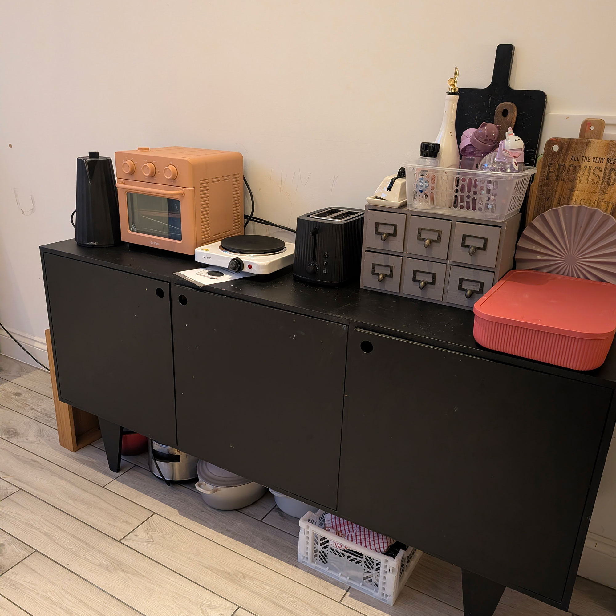 Temporary kitchen set up on dresser, with toaster, Wonder oven, kettle and hot place