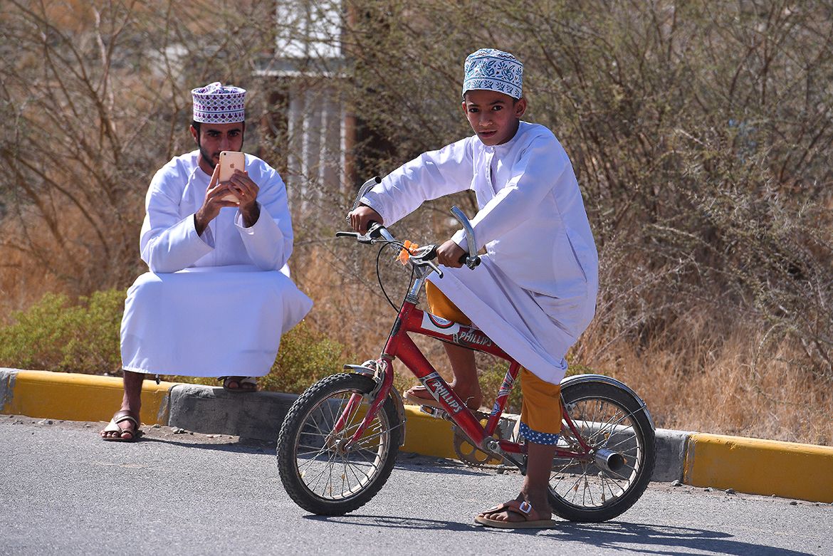 Locals enjoying the race coming to town