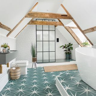 loft conversion with glazed gable and chunky wooden furniture