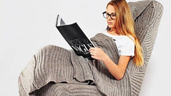 woman sitting on armchair 