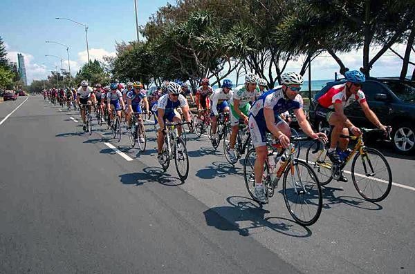 Simon Gillett leads the peloton into Surfers Paradise