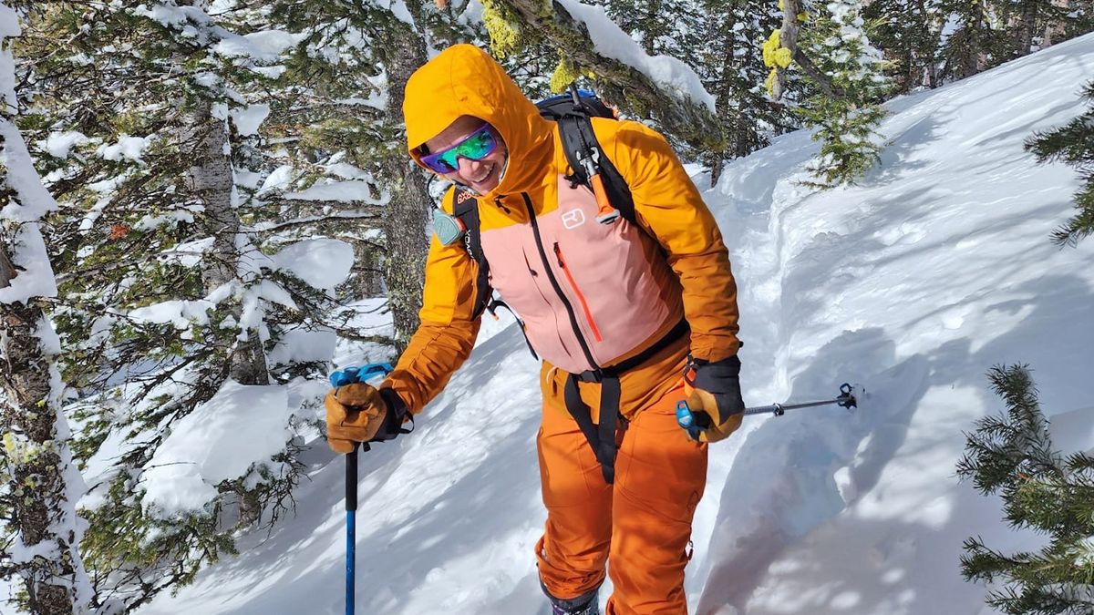 Woman wearing Ortovox Mesola ski jacket for skiing