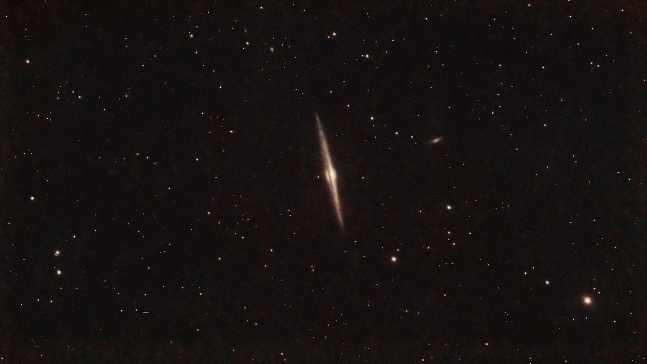 swirls of gas on a starry background