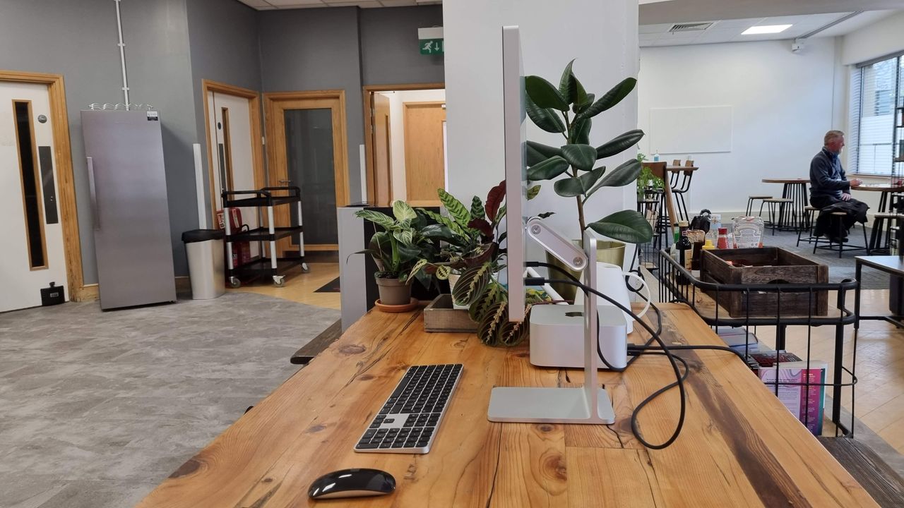 Studio Display on wooden desk