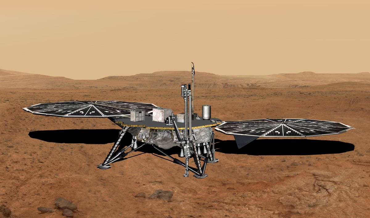 A general engineering model of NASA&#039;s proposed Mars Life Explorer spacecraft, with solar panels, drill and science payload on the lander deck.