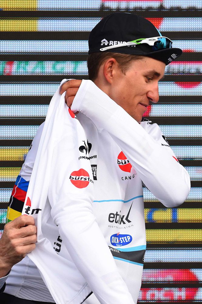 Kwiatkowski in the white jersey of best young rider.