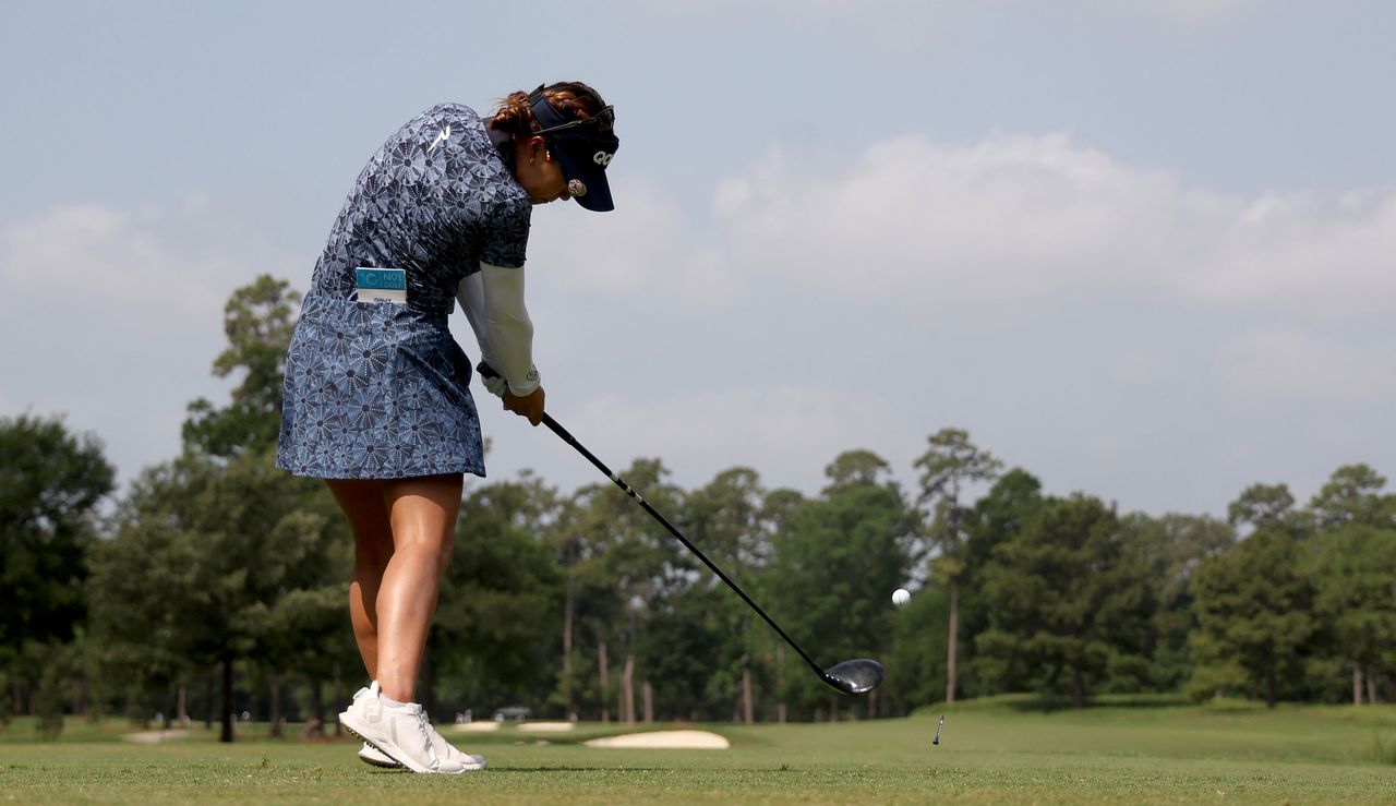 Jenny Shin hits a tee shot with a driver