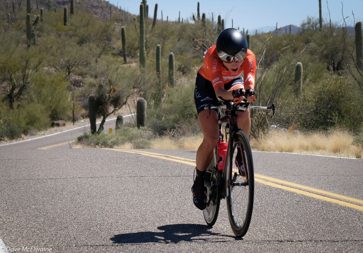 A Rally Team member finishes her time trial on an uphill finish