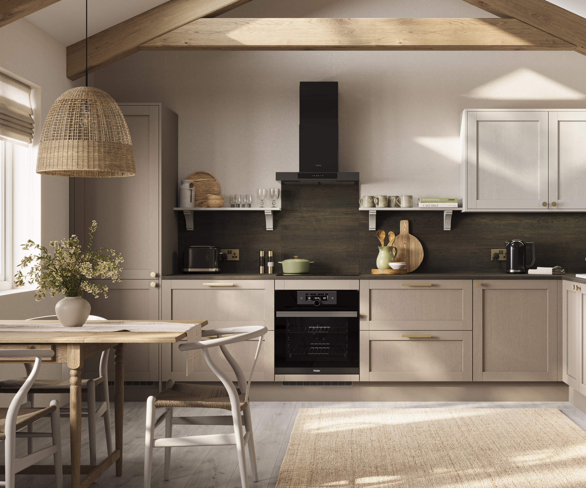 kitchen with putty coloured cabinets, wooden beams, rattan light above wooden dining table and cream rug on floor