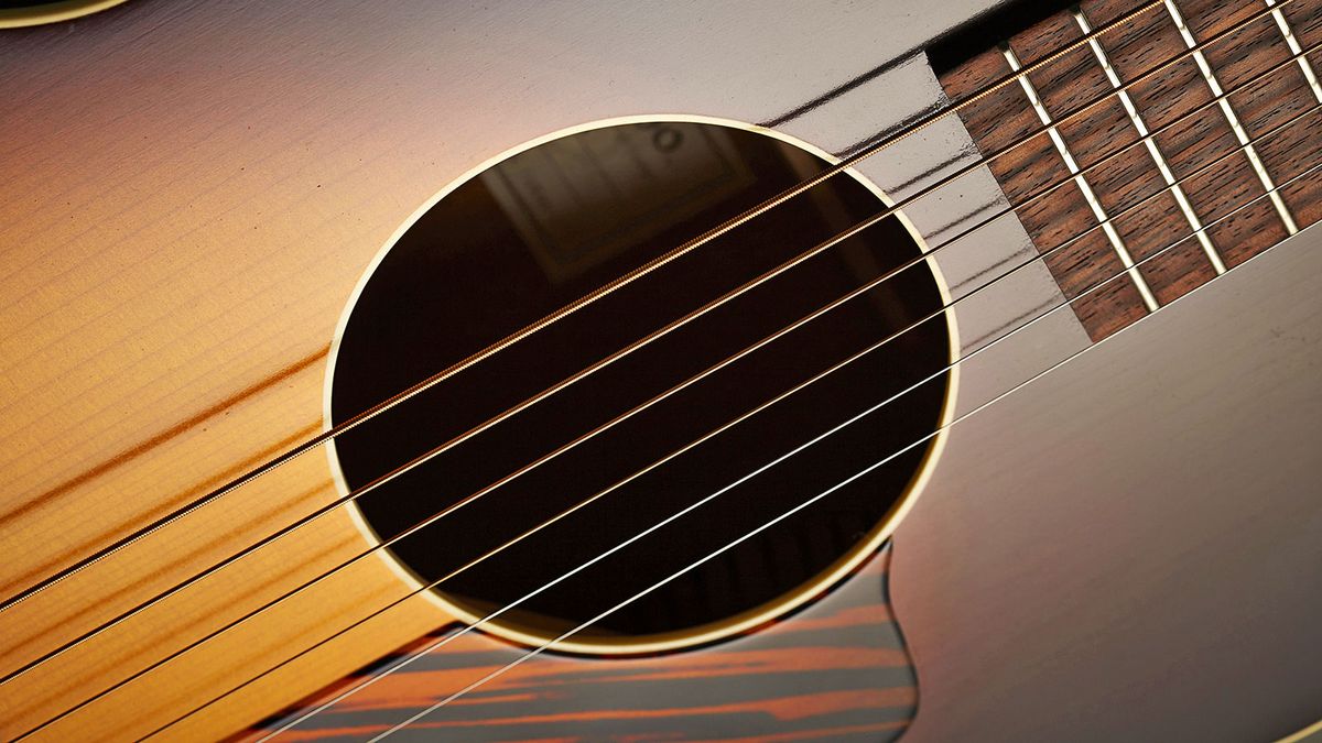 The body and soundhole are bound/ finished in ivoroid for the merest hint of aesthetic adornment
