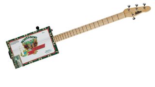 The long, thin neck has a Fender-style head, decent Grover tuners and a nicely cut bone nut
