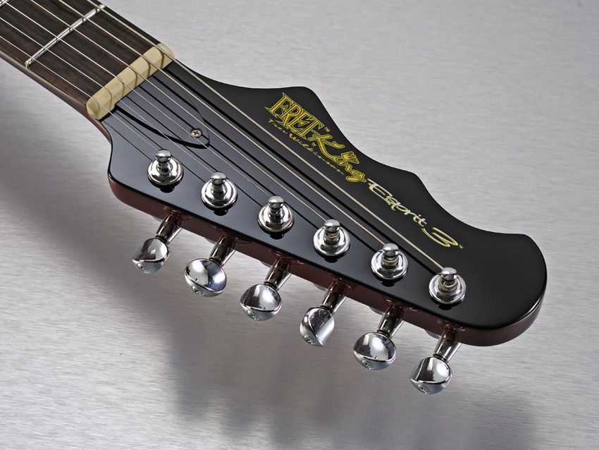 The reverse headstock recalls Epiphone's 'batwing' design