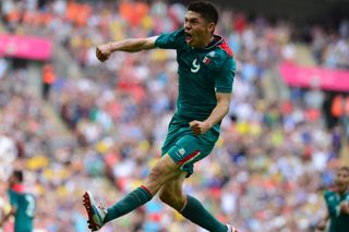 Mexico's Oribe Peralta celebrates after scoring his second goal against Brazil in the men's football final at the 2012 Olympics in London.