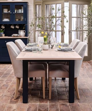 Upholstered dining chairs around a wooden table