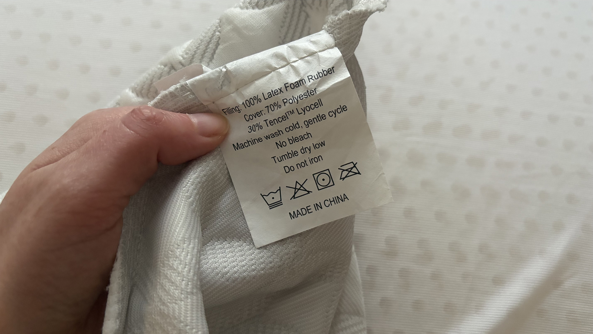 A close up of the care label on the Helix Talalay Latex pillow