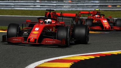 Ferrari drivers Sebastian Vettel and Charles Leclerc race in the 2020 F1 Belgium Grand Prix 
