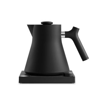 A black Fellow Corvo electric tea kettle