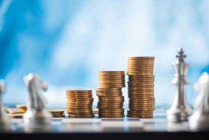 stack of coins on a chessboard