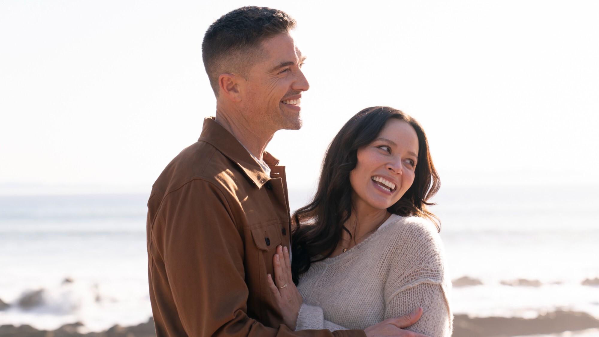 Lucy Chen (Melissa O'Neil) and Tim Bradford (Eric Winter) embrace on The Rookie.