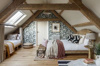 farmhouse bedroom with green and white patterned wallpaper