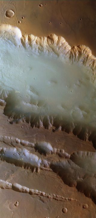 Mars is also known to have fog. This image of haze over Valles Marineris was taken by ESA Mars Express.