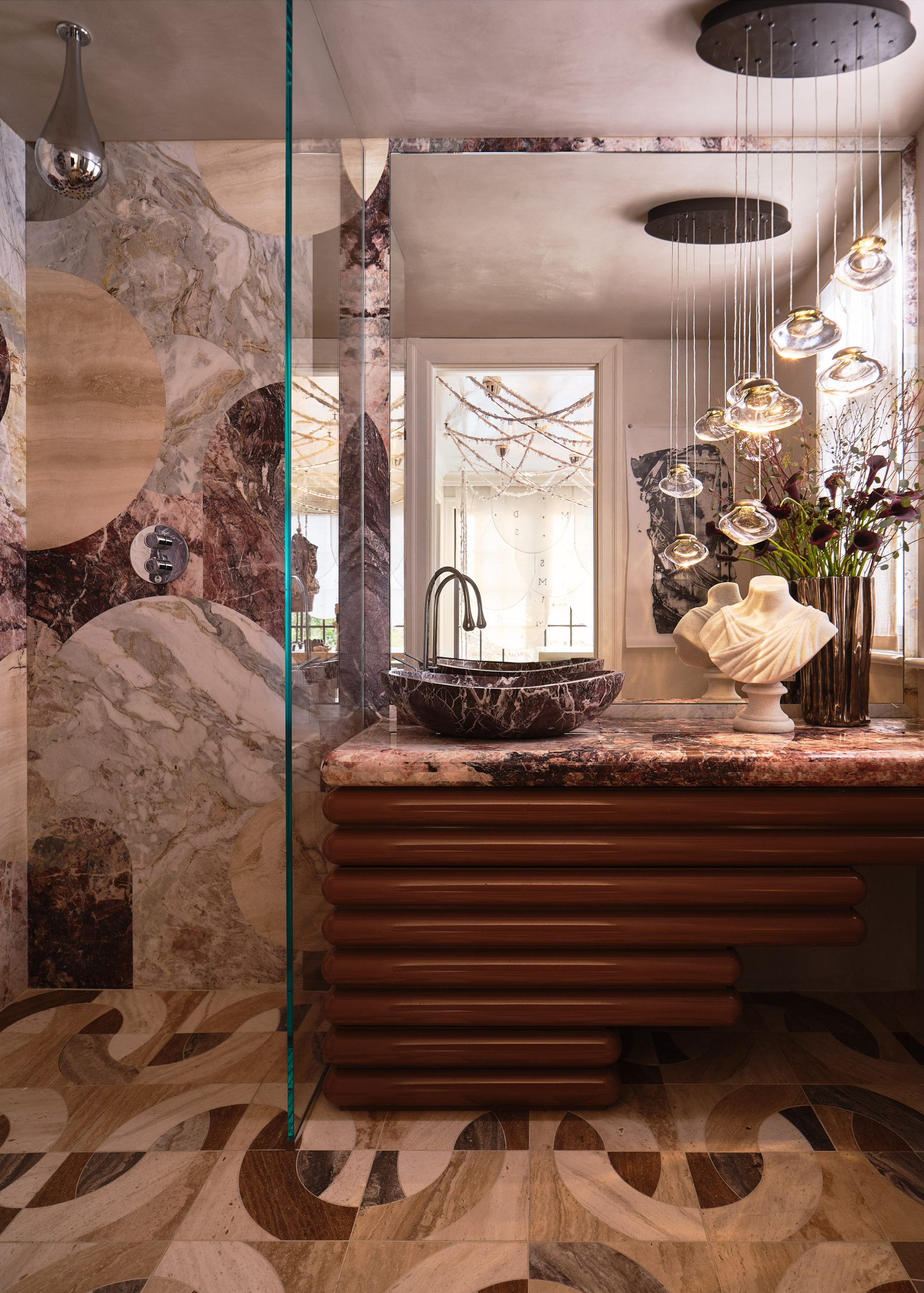 marble mosaic clad bathroom with plaster wash ceiling and tiered vanity