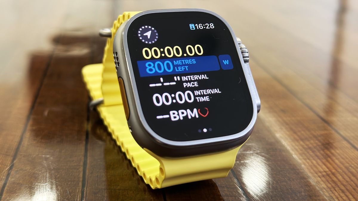 Apple Watch Ultra in use on wrist and on table