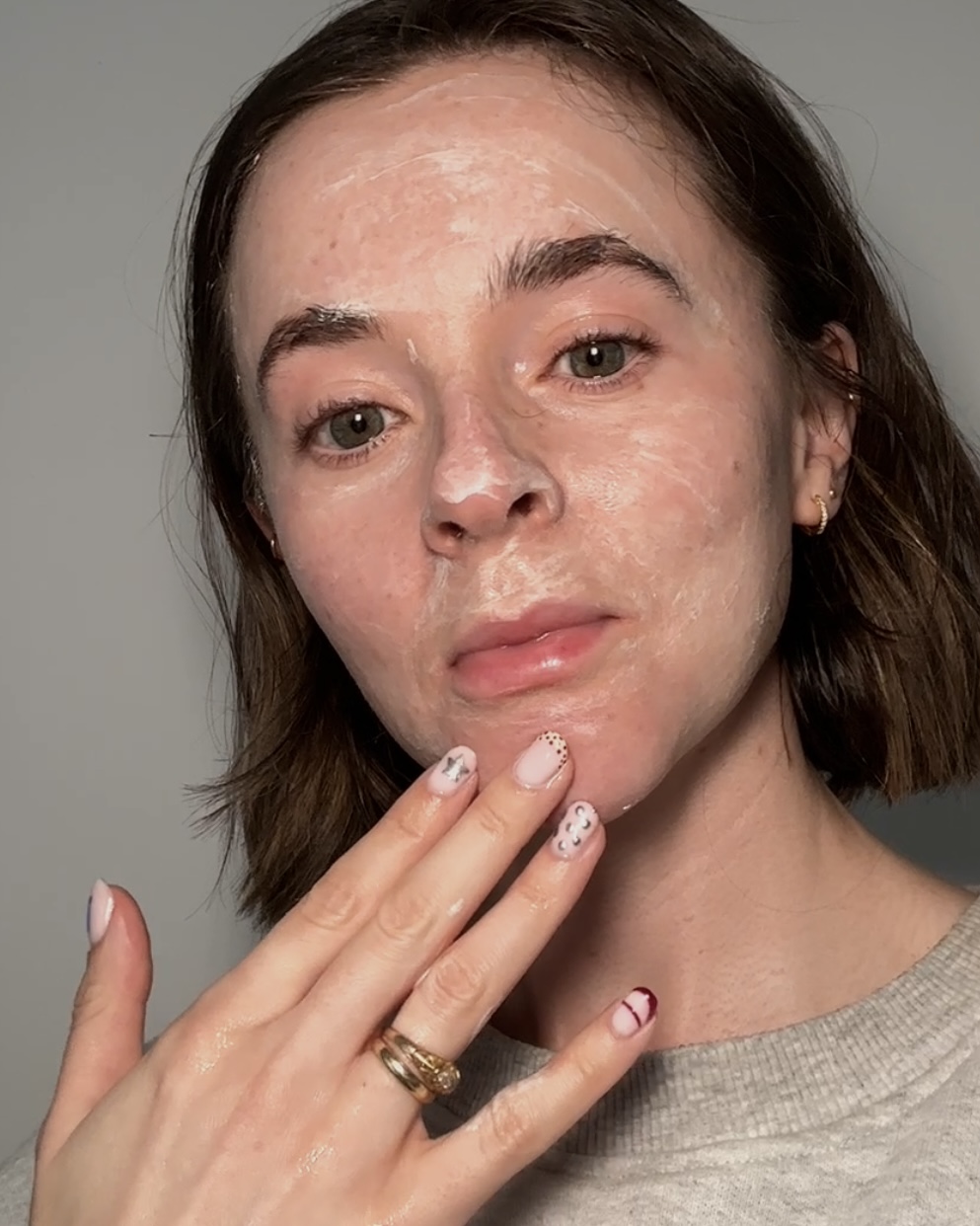 Grace Day applying skincare products