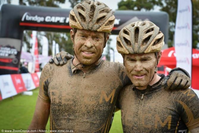Team RE:CM&rsquo;s Erik Kleinhans (left) and Waylon Woolcock pose at the finish line after finishing second on Stage 1