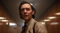 Loki (Tom Hiddleston) looks ahead in Loki.