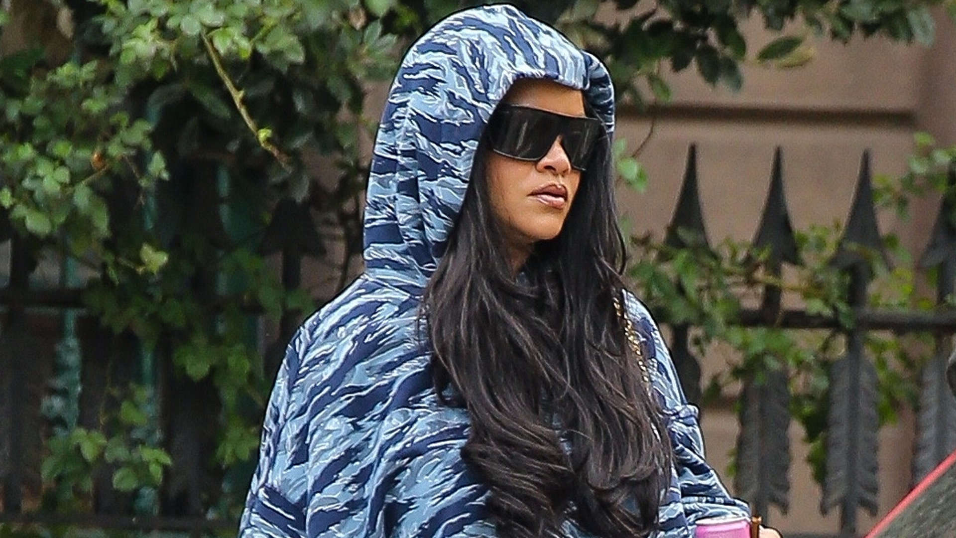 Rihanna wore the tiger-print trend with jeans and snakeskin Miu Miu sneakers