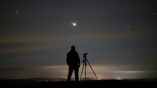 The author stood infront of the conjunction of Mars and Jupiter