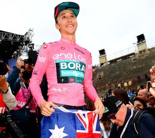 VERONA, ITALY - MAY 29: Jai Hindley of Australia and Team Bora - Hansgrohe Pink Leader Jersey celebrates at podium with the Trofeo Senza Fine as overall race winner during the 105th Giro d'Italia 2022, Stage 21 a 17,4km individual time trial stage from Verona to Verona / ITT / #Giro / #WorldTour / on May 29, 2022 in Verona, Italy. (Photo by Tim de Waele/Getty Images)