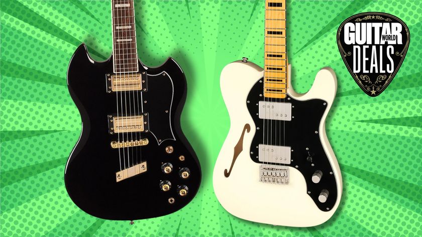 A Guild and a Fender electric guitar on a green background