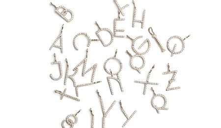 A mix of Alexandra Jefford gold and diamond alphabet charms