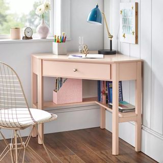 Pink corner desk in home office