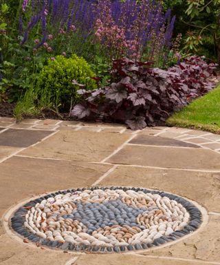 stone mosaic on garden paving