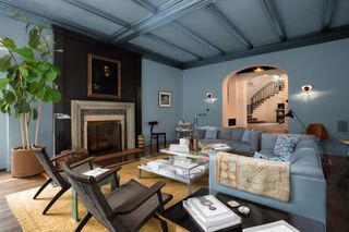 A monochromatic blue living room