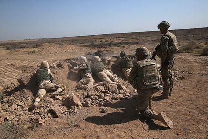U.S. Army trainers instruct Iraqi Army recruits in Iraq