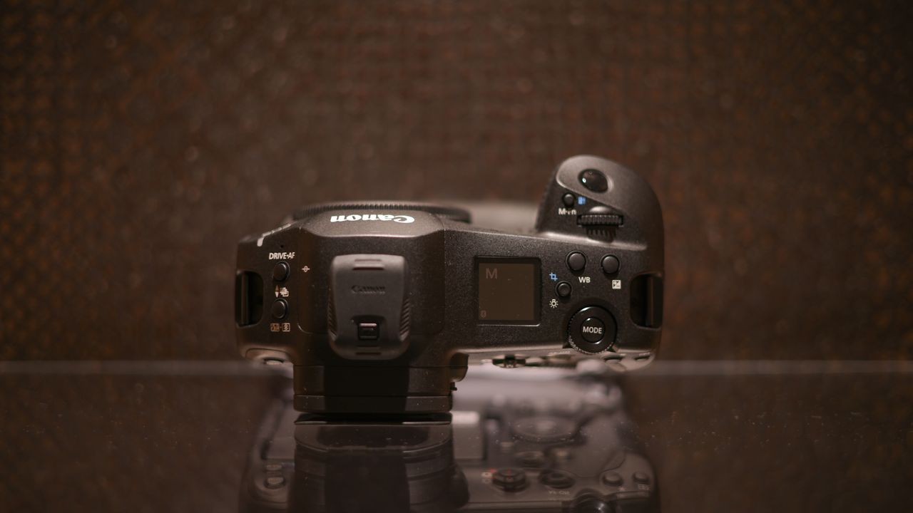 Canon EOS R1 against a dark background