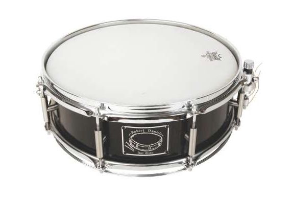 The bog oak snare is the only standard size drum here, showing the flexibility of Fine Drums