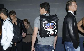 Model wearing Dsquared2 backpack