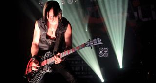 Amir Derakh plays a custom single-cut onstage