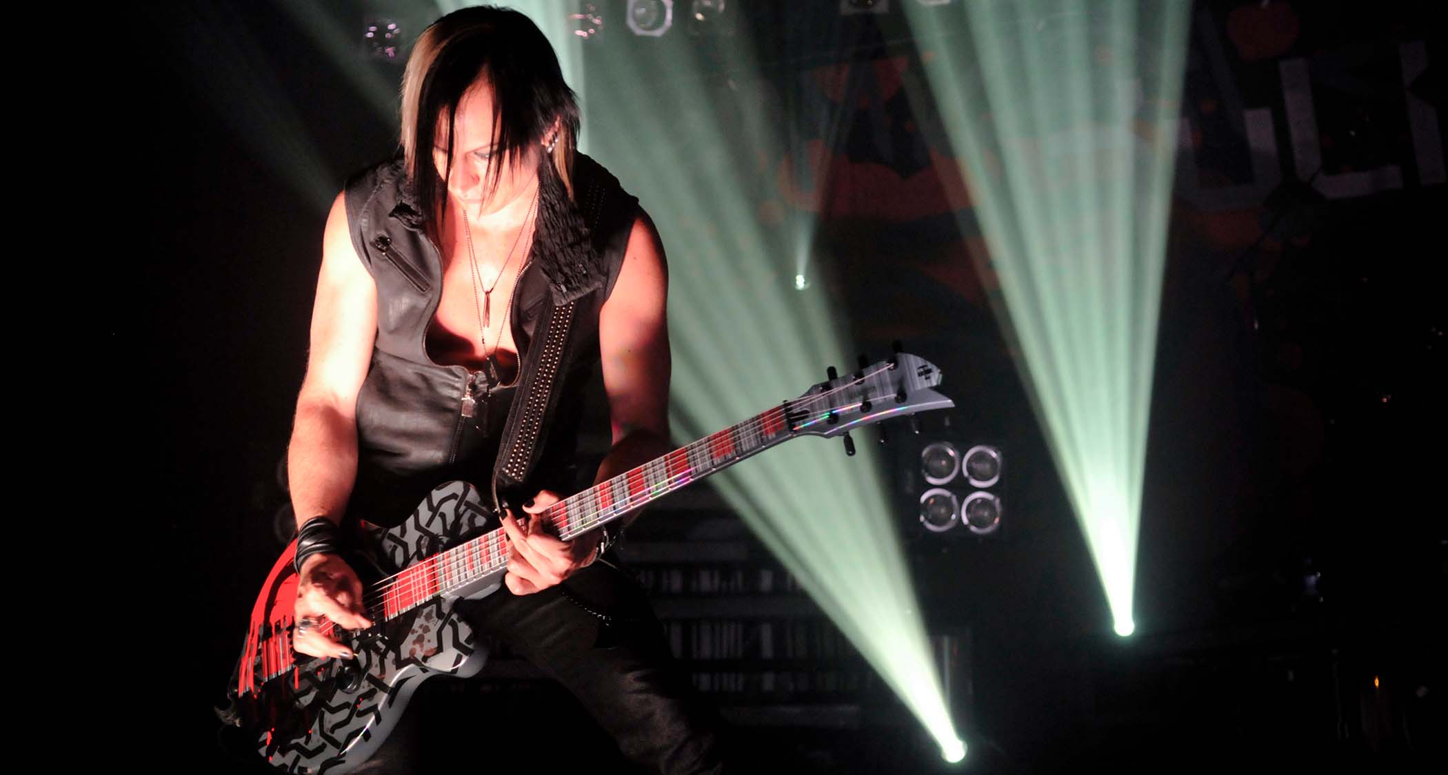 Amir Derakh plays a custom single-cut onstage