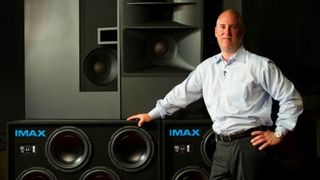 Brian Bonnick in front of an IMAX speaker bank