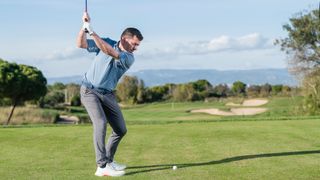PGA pro Dan Grieve swinging a golf club at Infinitum Golf Resort in Spain